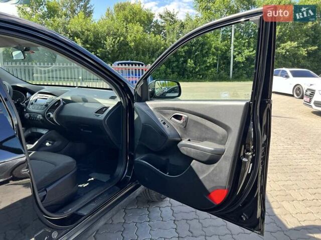 Чорний Хендай Туксон, об'ємом двигуна 2 л та пробігом 164 тис. км за 11490 $, фото 22 на Automoto.ua