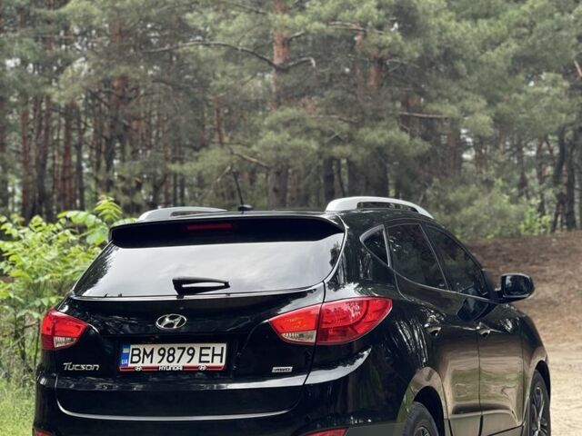 Чорний Хендай Туксон, об'ємом двигуна 2.4 л та пробігом 140 тис. км за 11999 $, фото 4 на Automoto.ua