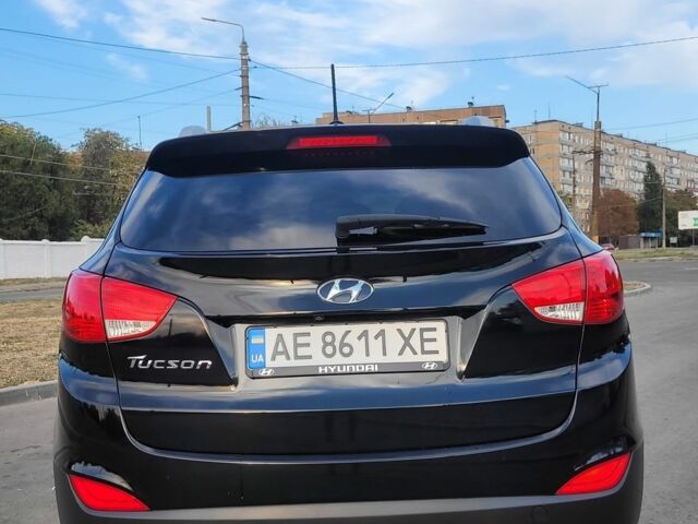 Черный Хендай Туксон, объемом двигателя 2.4 л и пробегом 130 тыс. км за 12400 $, фото 9 на Automoto.ua