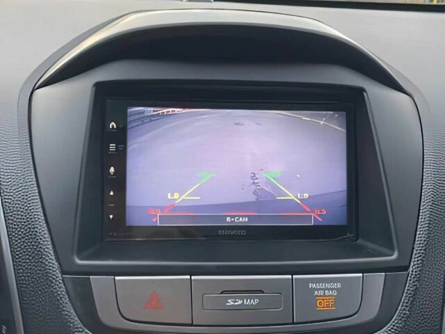 Черный Хендай Туксон, объемом двигателя 2.4 л и пробегом 80 тыс. км за 13000 $, фото 8 на Automoto.ua