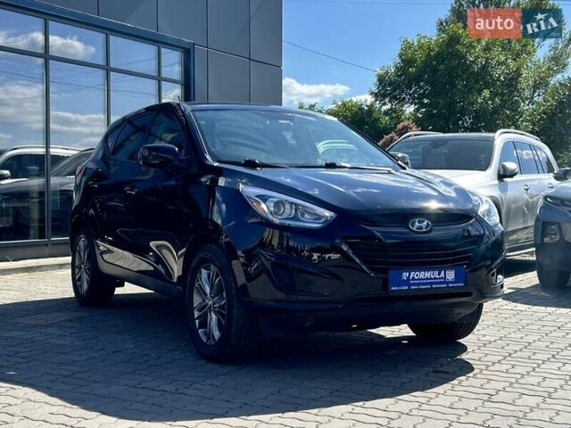 Чорний Хендай Туксон, об'ємом двигуна 2 л та пробігом 164 тис. км за 11490 $, фото 4 на Automoto.ua