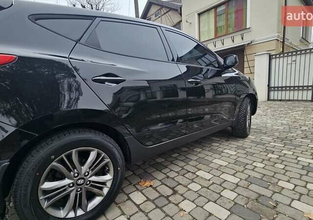 Чорний Хендай Туксон, об'ємом двигуна 2 л та пробігом 160 тис. км за 12300 $, фото 6 на Automoto.ua