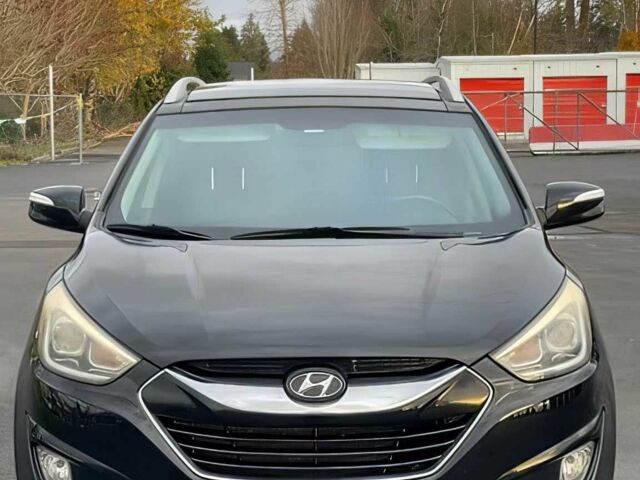 Черный Хендай Туксон, объемом двигателя 2.4 л и пробегом 80 тыс. км за 13000 $, фото 1 на Automoto.ua