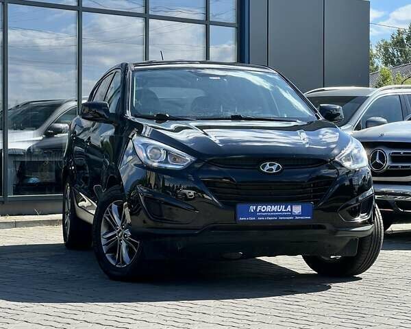 Чорний Хендай Туксон, об'ємом двигуна 2 л та пробігом 164 тис. км за 11490 $, фото 1 на Automoto.ua