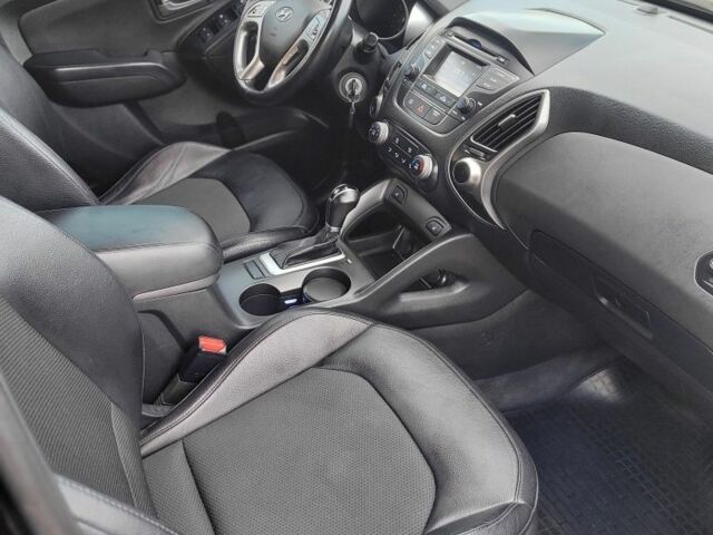 Черный Хендай Туксон, объемом двигателя 2.4 л и пробегом 130 тыс. км за 12400 $, фото 17 на Automoto.ua