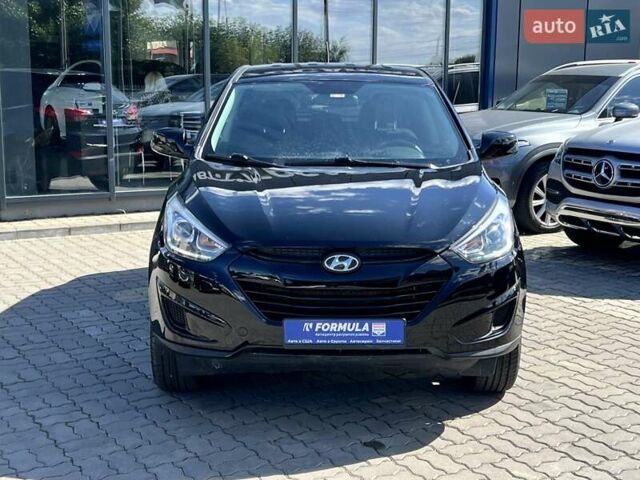 Чорний Хендай Туксон, об'ємом двигуна 2 л та пробігом 164 тис. км за 11490 $, фото 5 на Automoto.ua