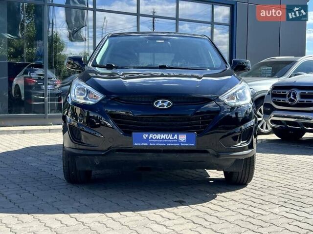 Чорний Хендай Туксон, об'ємом двигуна 2 л та пробігом 164 тис. км за 11490 $, фото 6 на Automoto.ua