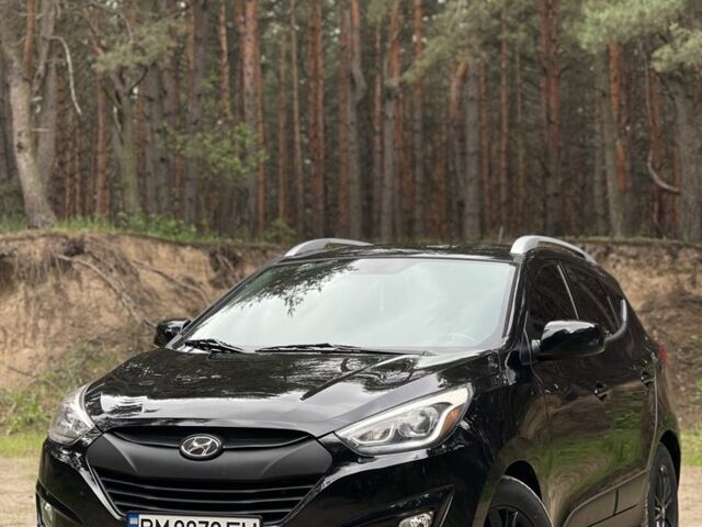 Черный Хендай Туксон, объемом двигателя 2.4 л и пробегом 140 тыс. км за 12499 $, фото 1 на Automoto.ua
