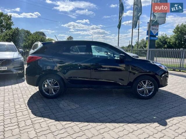 Чорний Хендай Туксон, об'ємом двигуна 2 л та пробігом 164 тис. км за 11490 $, фото 2 на Automoto.ua
