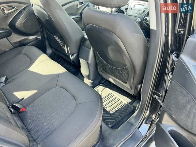 Чорний Хендай Туксон, об'ємом двигуна 2 л та пробігом 164 тис. км за 11490 $, фото 27 на Automoto.ua