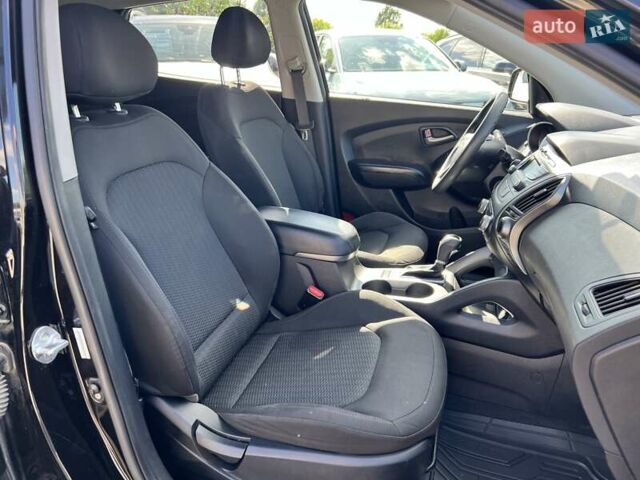 Чорний Хендай Туксон, об'ємом двигуна 2 л та пробігом 164 тис. км за 11490 $, фото 23 на Automoto.ua