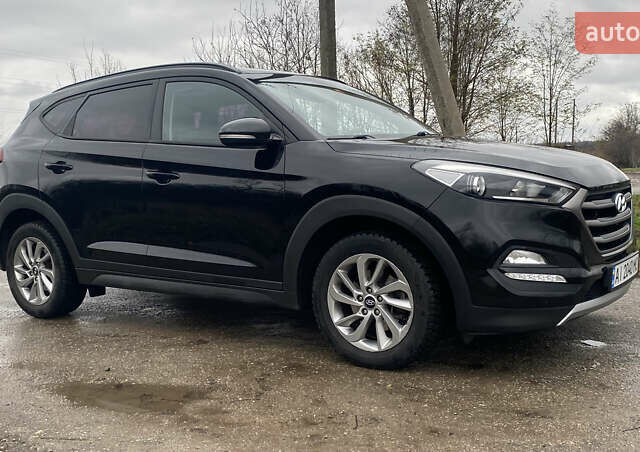 Черный Хендай Туксон, объемом двигателя 2 л и пробегом 190 тыс. км за 18000 $, фото 3 на Automoto.ua