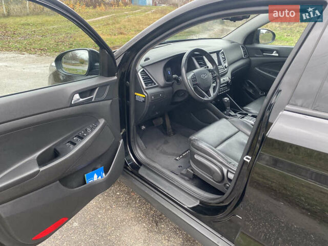 Черный Хендай Туксон, объемом двигателя 2 л и пробегом 190 тыс. км за 18000 $, фото 11 на Automoto.ua