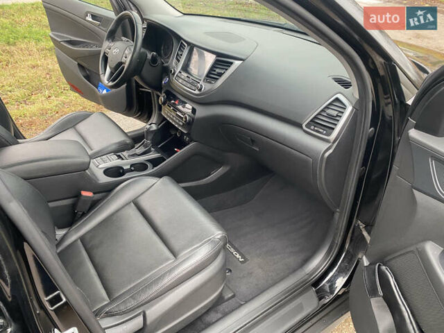 Черный Хендай Туксон, объемом двигателя 2 л и пробегом 190 тыс. км за 18000 $, фото 20 на Automoto.ua