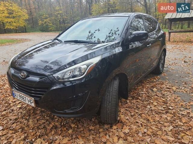 Чорний Хендай Туксон, об'ємом двигуна 2 л та пробігом 109 тис. км за 14500 $, фото 2 на Automoto.ua