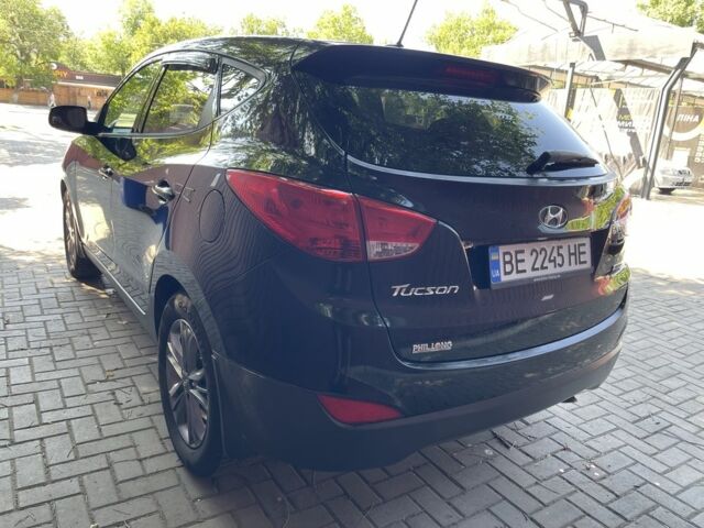 Чорний Хендай Туксон, об'ємом двигуна 2 л та пробігом 140 тис. км за 12300 $, фото 4 на Automoto.ua