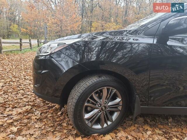 Чорний Хендай Туксон, об'ємом двигуна 2 л та пробігом 109 тис. км за 14500 $, фото 4 на Automoto.ua