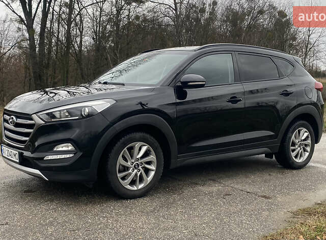 Черный Хендай Туксон, объемом двигателя 2 л и пробегом 190 тыс. км за 18000 $, фото 7 на Automoto.ua