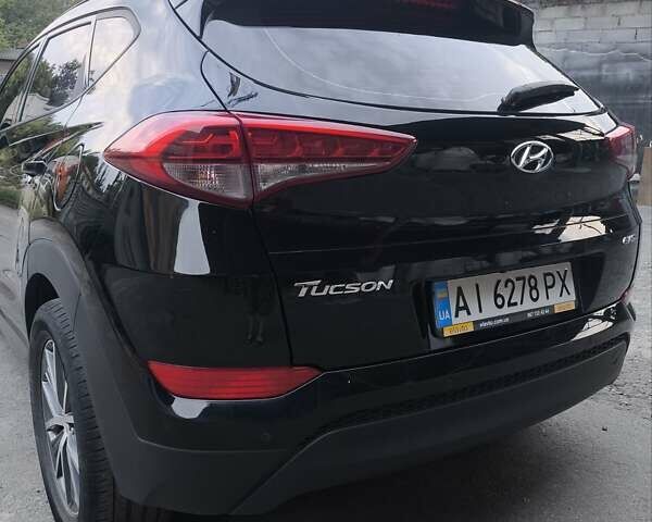 Чорний Хендай Туксон, об'ємом двигуна 1.7 л та пробігом 220 тис. км за 16000 $, фото 4 на Automoto.ua