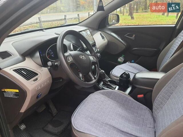 Чорний Хендай Туксон, об'ємом двигуна 2 л та пробігом 109 тис. км за 14500 $, фото 10 на Automoto.ua