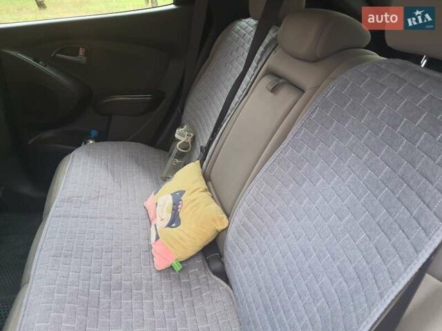 Чорний Хендай Туксон, об'ємом двигуна 2 л та пробігом 109 тис. км за 14500 $, фото 15 на Automoto.ua