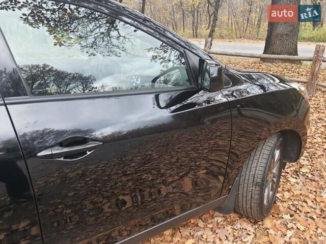 Чорний Хендай Туксон, об'ємом двигуна 2 л та пробігом 109 тис. км за 14500 $, фото 8 на Automoto.ua