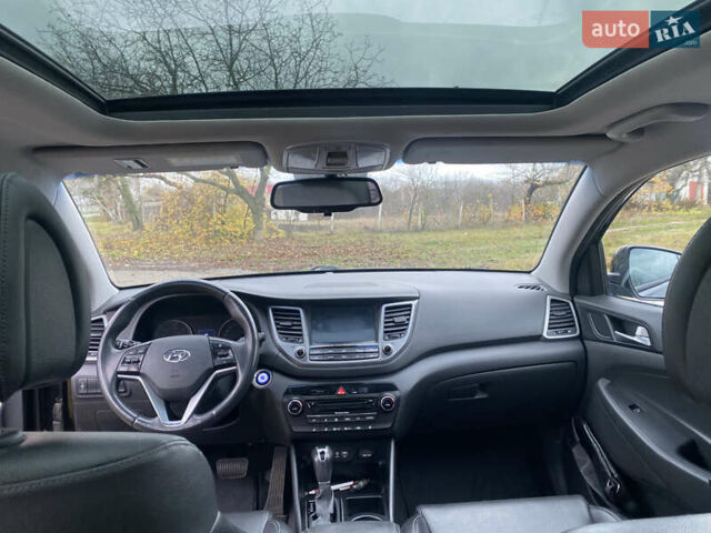 Черный Хендай Туксон, объемом двигателя 2 л и пробегом 190 тыс. км за 18000 $, фото 17 на Automoto.ua