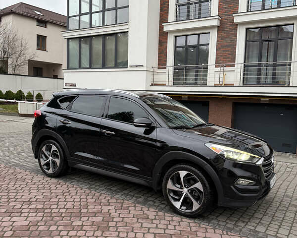 Черный Хендай Туксон, объемом двигателя 1.6 л и пробегом 123 тыс. км за 17500 $, фото 5 на Automoto.ua