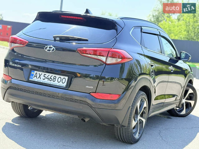 Черный Хендай Туксон, объемом двигателя 2 л и пробегом 150 тыс. км за 17499 $, фото 7 на Automoto.ua