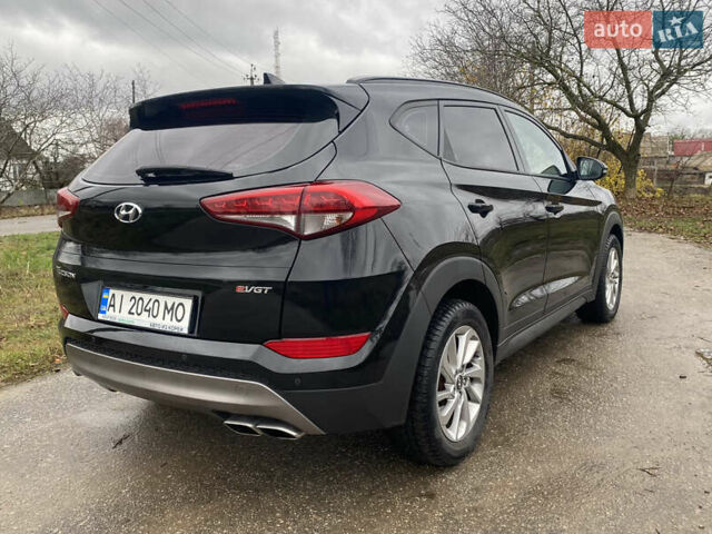 Черный Хендай Туксон, объемом двигателя 2 л и пробегом 190 тыс. км за 18000 $, фото 5 на Automoto.ua