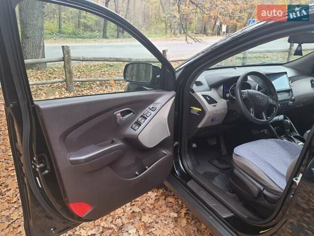 Чорний Хендай Туксон, об'ємом двигуна 2 л та пробігом 109 тис. км за 14500 $, фото 11 на Automoto.ua