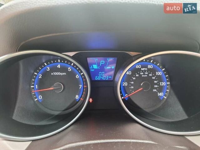 Чорний Хендай Туксон, об'ємом двигуна 2 л та пробігом 109 тис. км за 14500 $, фото 12 на Automoto.ua