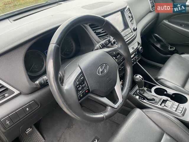 Черный Хендай Туксон, объемом двигателя 2 л и пробегом 190 тыс. км за 18000 $, фото 13 на Automoto.ua