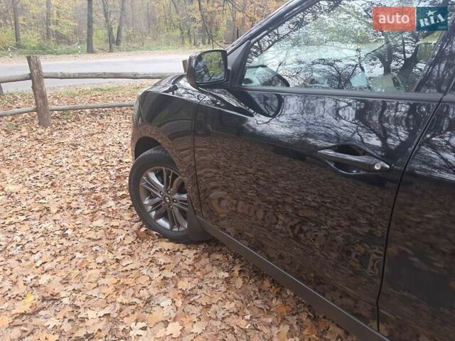 Чорний Хендай Туксон, об'ємом двигуна 2 л та пробігом 109 тис. км за 14500 $, фото 1 на Automoto.ua