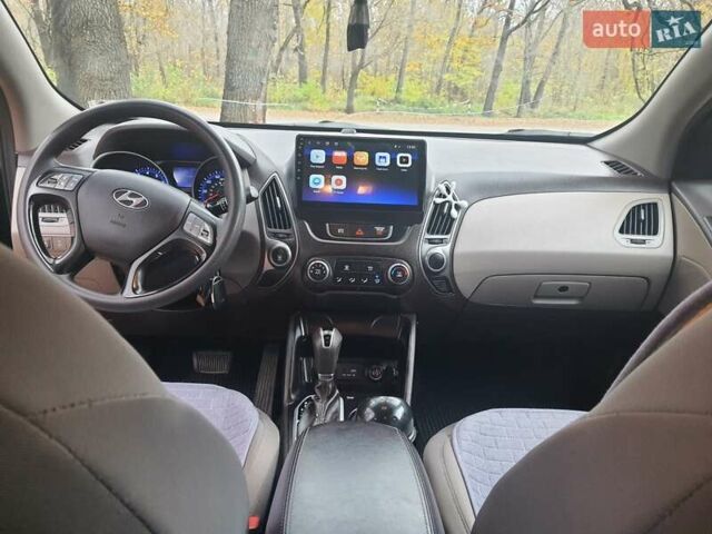 Чорний Хендай Туксон, об'ємом двигуна 2 л та пробігом 109 тис. км за 14500 $, фото 16 на Automoto.ua