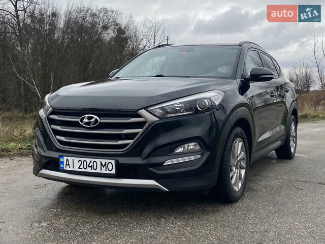 Черный Хендай Туксон, объемом двигателя 2 л и пробегом 190 тыс. км за 18000 $, фото 1 на Automoto.ua