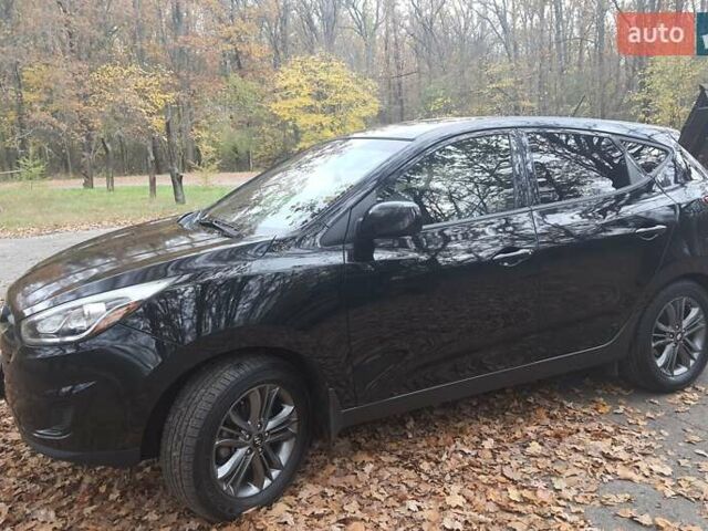 Чорний Хендай Туксон, об'ємом двигуна 2 л та пробігом 109 тис. км за 14500 $, фото 18 на Automoto.ua