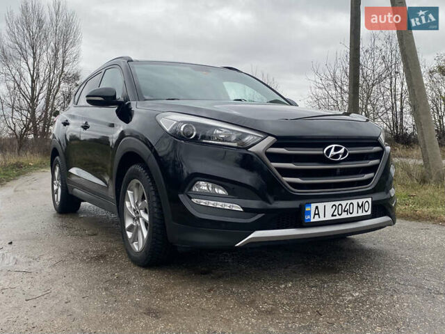 Черный Хендай Туксон, объемом двигателя 2 л и пробегом 190 тыс. км за 18000 $, фото 2 на Automoto.ua