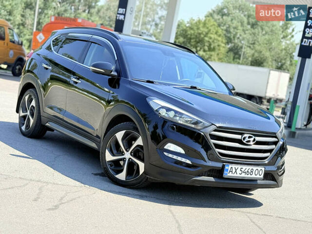 Черный Хендай Туксон, объемом двигателя 2 л и пробегом 150 тыс. км за 17499 $, фото 4 на Automoto.ua