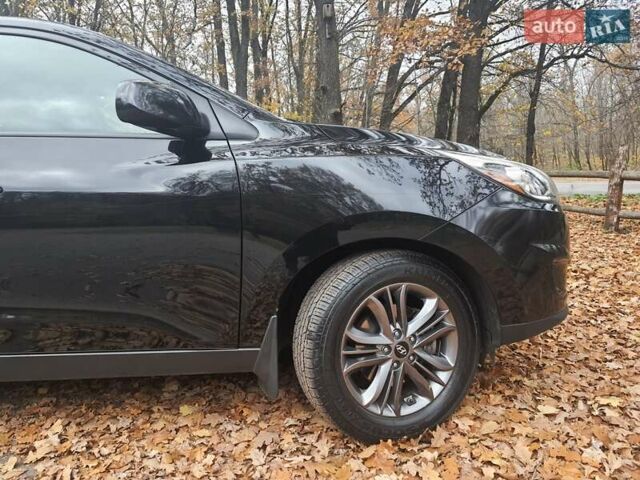 Чорний Хендай Туксон, об'ємом двигуна 2 л та пробігом 109 тис. км за 14500 $, фото 9 на Automoto.ua