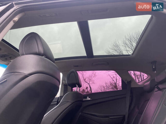 Черный Хендай Туксон, объемом двигателя 2 л и пробегом 190 тыс. км за 18000 $, фото 16 на Automoto.ua