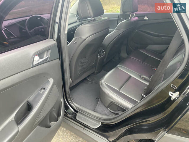 Черный Хендай Туксон, объемом двигателя 2 л и пробегом 190 тыс. км за 18000 $, фото 15 на Automoto.ua