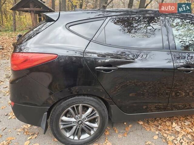 Чорний Хендай Туксон, об'ємом двигуна 2 л та пробігом 109 тис. км за 14500 $, фото 5 на Automoto.ua