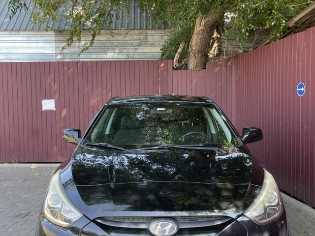 Чорний Хендай Туксон, об'ємом двигуна 2 л та пробігом 140 тис. км за 12300 $, фото 1 на Automoto.ua