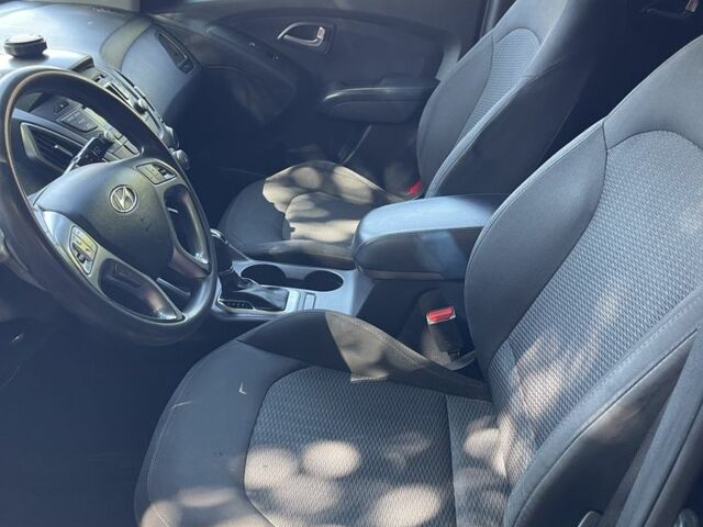 Чорний Хендай Туксон, об'ємом двигуна 2 л та пробігом 140 тис. км за 12300 $, фото 8 на Automoto.ua