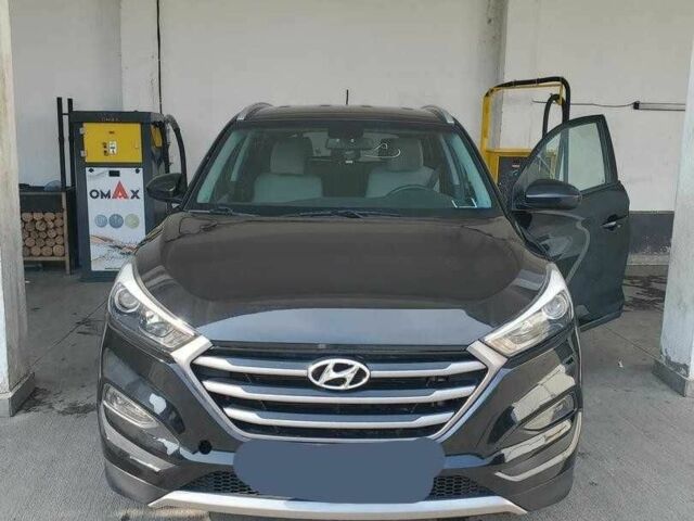 Чорний Хендай Туксон, об'ємом двигуна 2 л та пробігом 104 тис. км за 10100 $, фото 1 на Automoto.ua