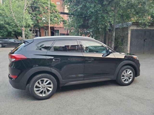 Чорний Хендай Туксон, об'ємом двигуна 2 л та пробігом 104 тис. км за 10100 $, фото 12 на Automoto.ua