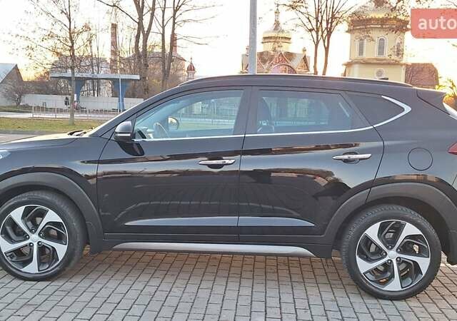 Чорний Хендай Туксон, об'ємом двигуна 2 л та пробігом 192 тис. км за 21000 $, фото 20 на Automoto.ua