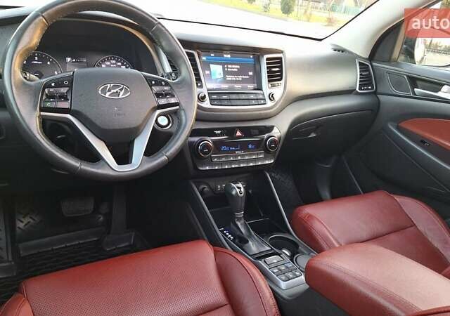 Чорний Хендай Туксон, об'ємом двигуна 2 л та пробігом 192 тис. км за 21000 $, фото 44 на Automoto.ua