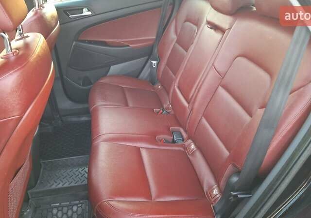 Чорний Хендай Туксон, об'ємом двигуна 2 л та пробігом 192 тис. км за 21000 $, фото 43 на Automoto.ua